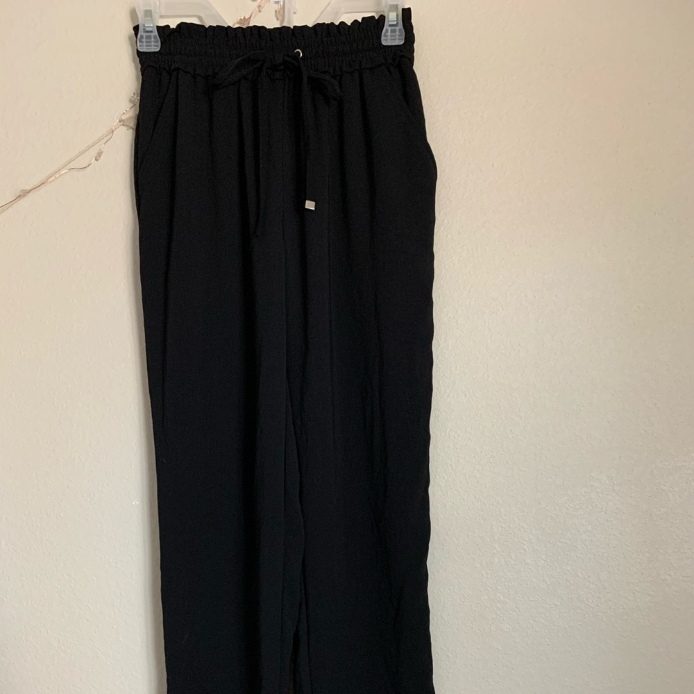 Black, drawstring pants. Size 4 (women’s)